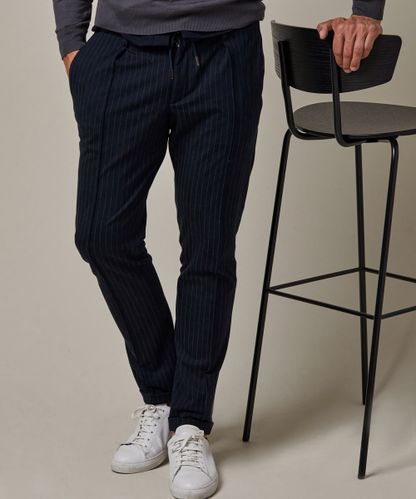PROFUOMO Navy tech knitted sportcord trousers
